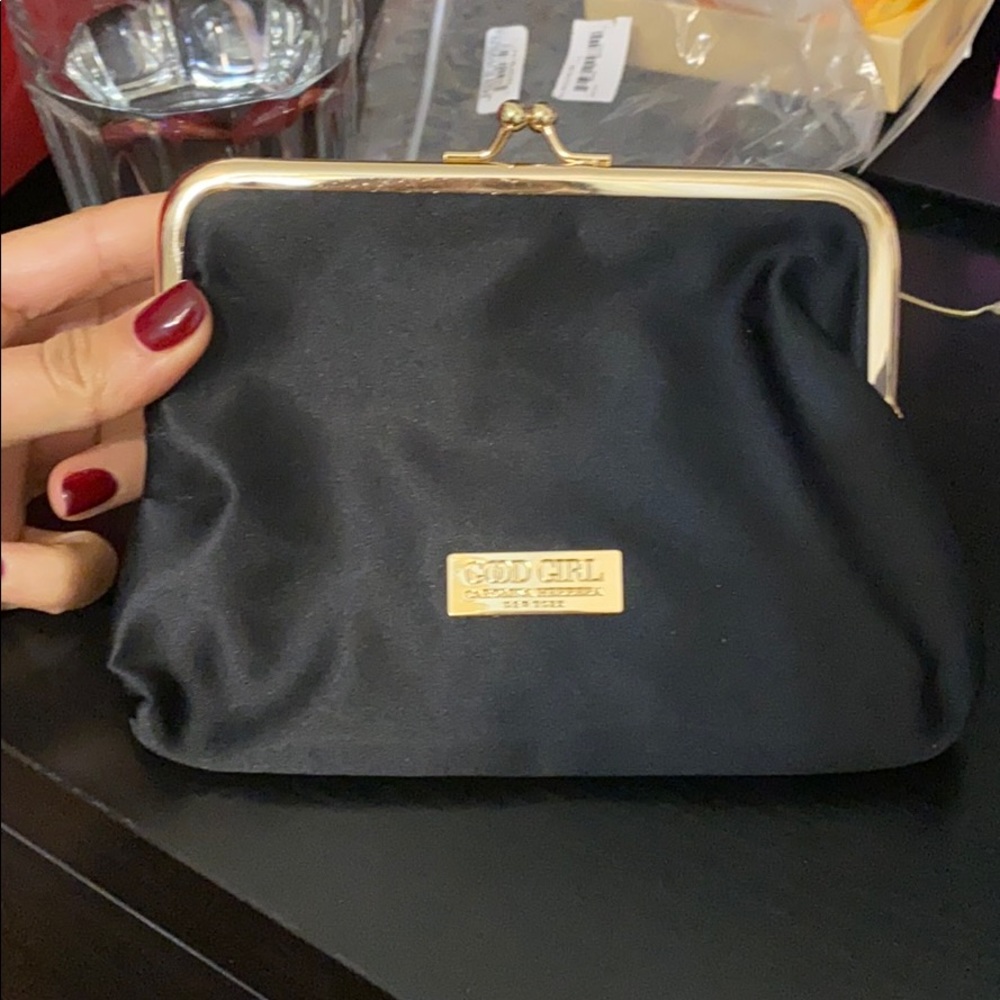 Carolina Herrera bag for makeup or anything!